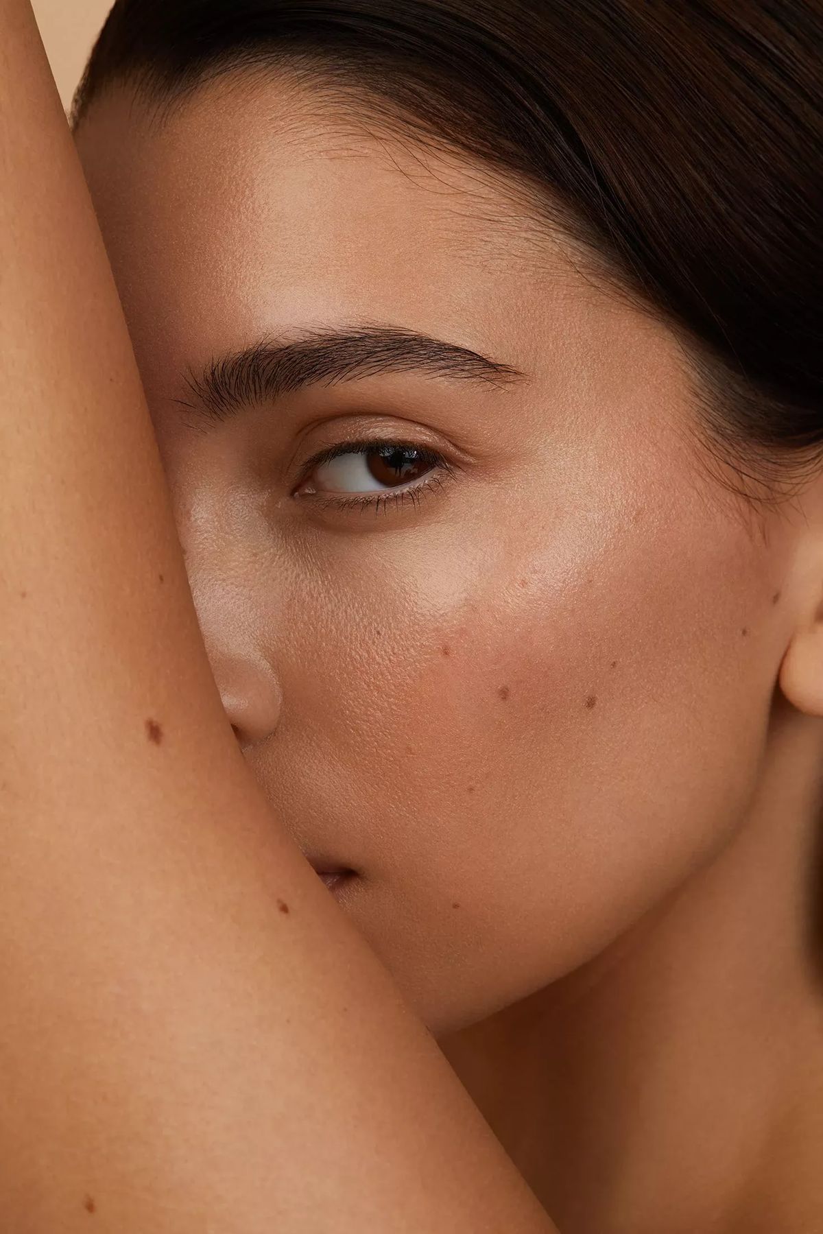 Editorial portrait — luminous skin, beauty close-up